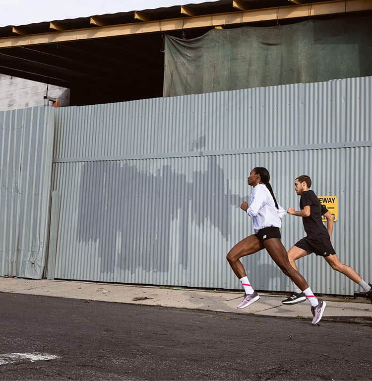 People running in New Balance shoes